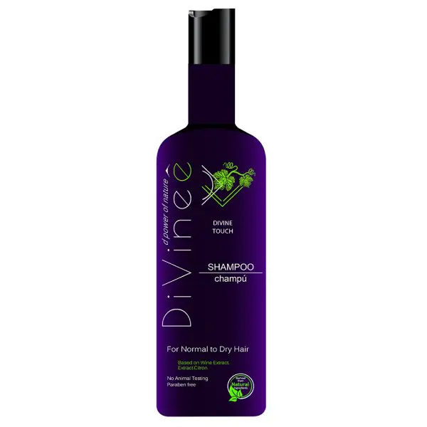 A bottle of divineco hair care products.