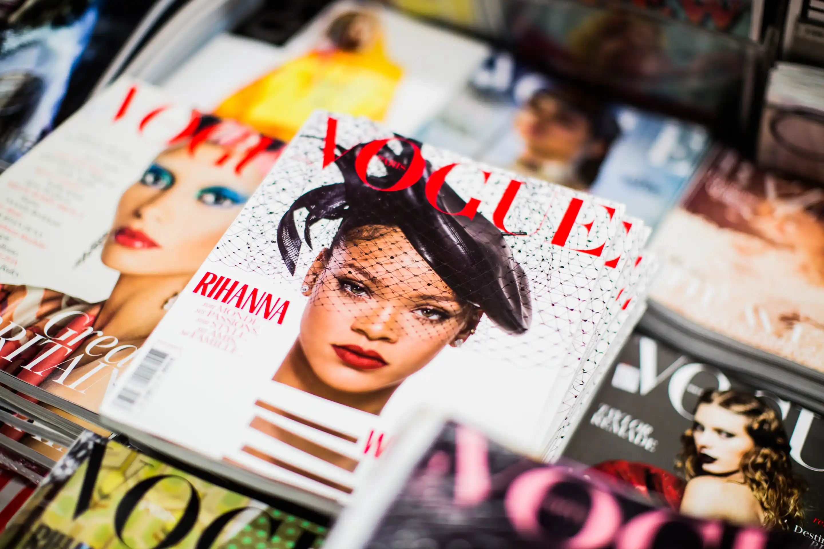 A close up of magazines with pictures on them